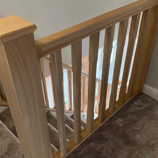 Staircase Refurbishment Southampton 44 Oak spindles and newel post on a landing balustrade